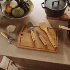 Paistinlasta Fiskars Folken